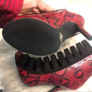Red snakeskin booties